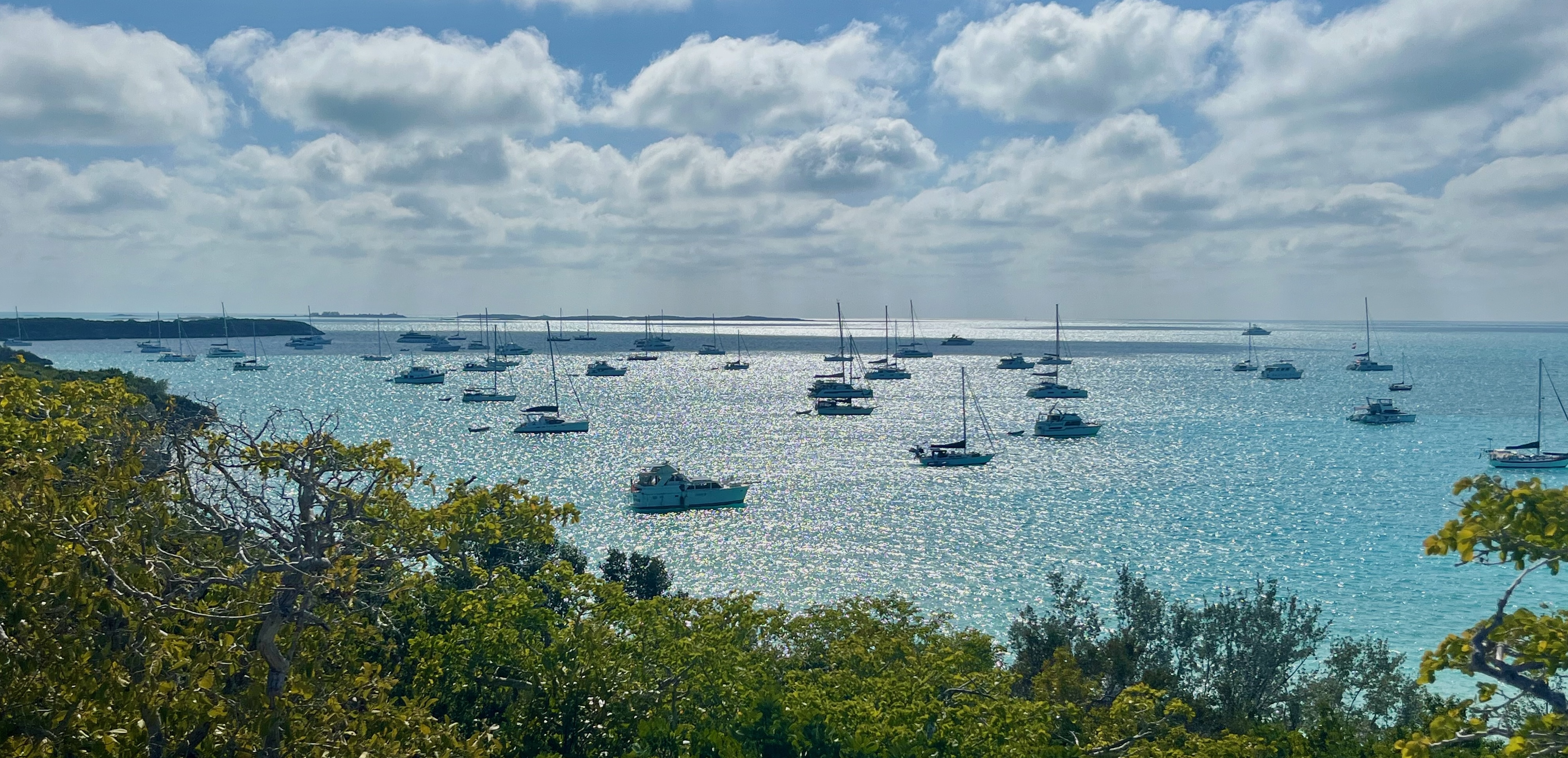 The busy anchorage at Big Major Cay in the Exumas, Bahamas — where Bob the sourdough starter arrived by dinghy